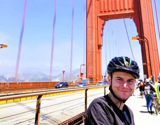 Tiener met de fiets Golden Gate Bridge San Francisco